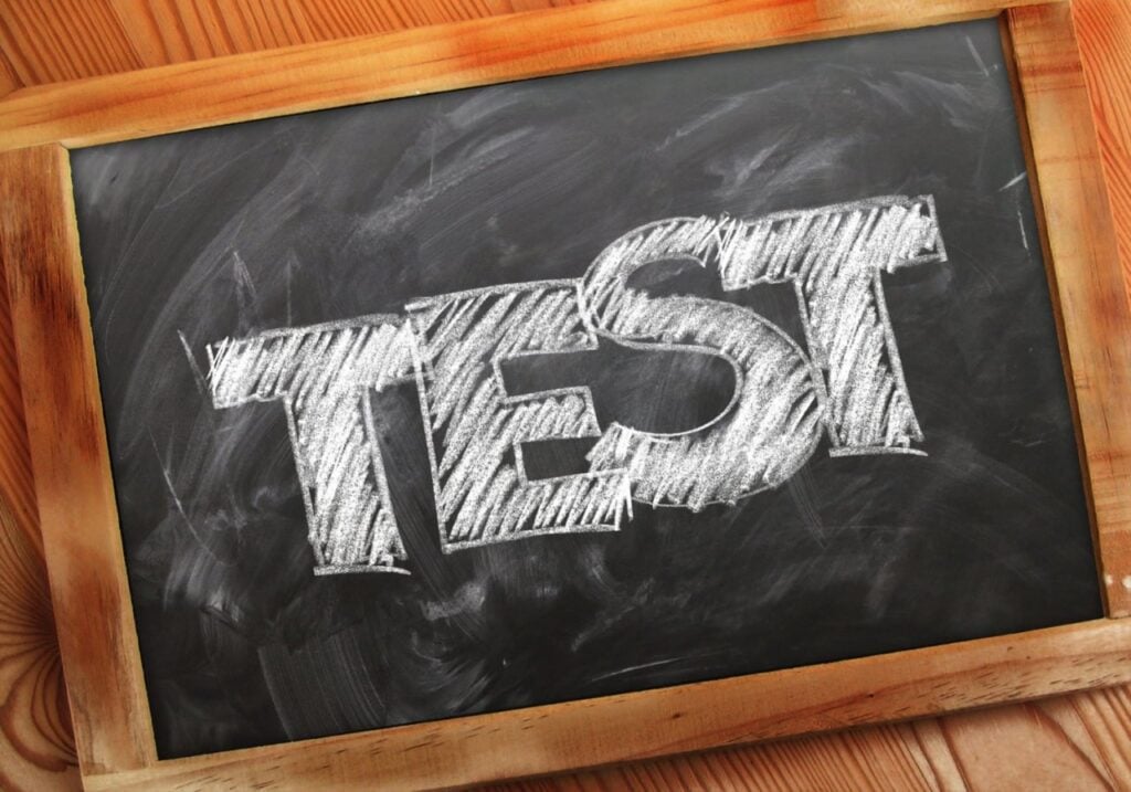 "Chalkboard with the word TEST representing Python Unit Testing using pytest"